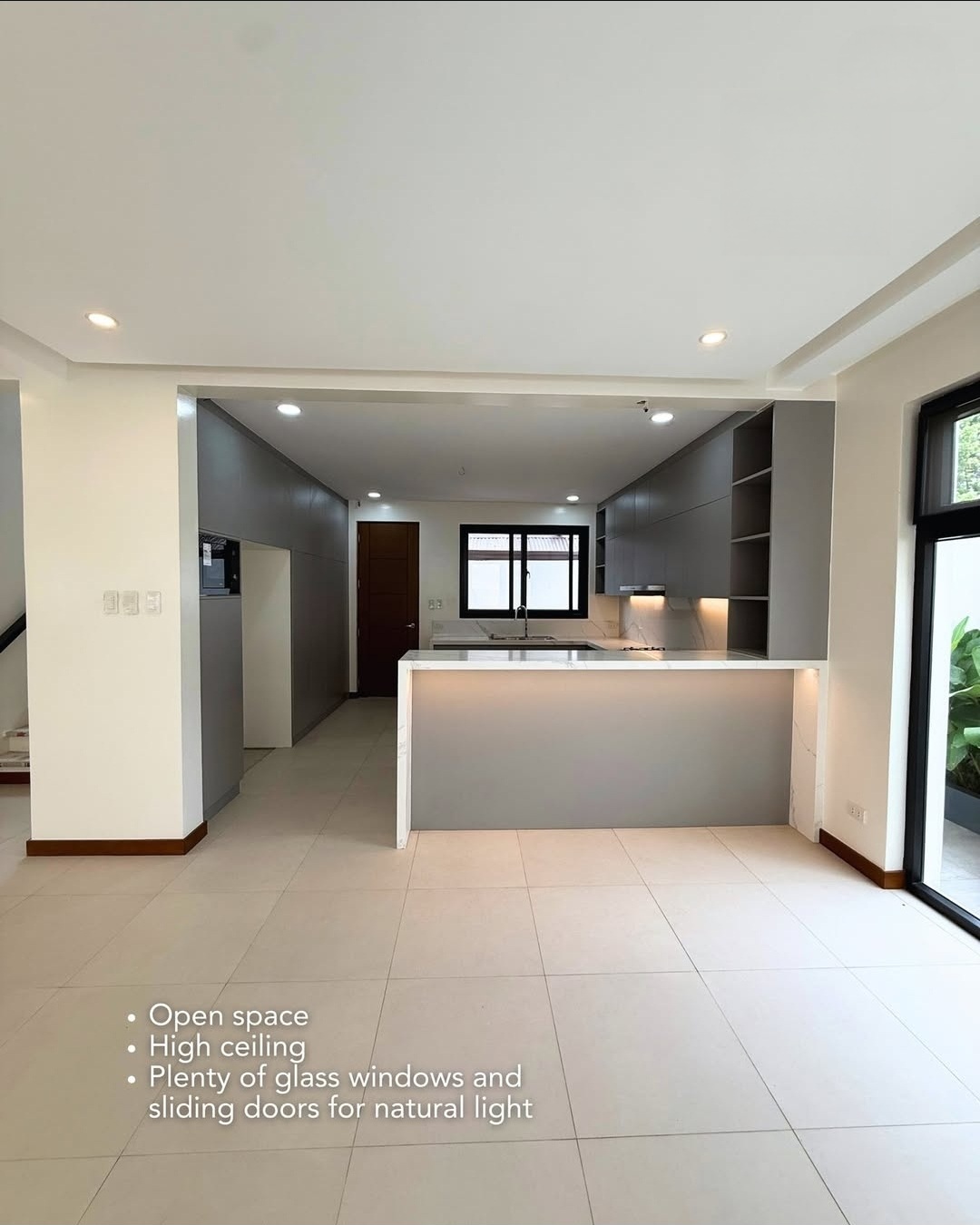Living area opening to the modern kitchen