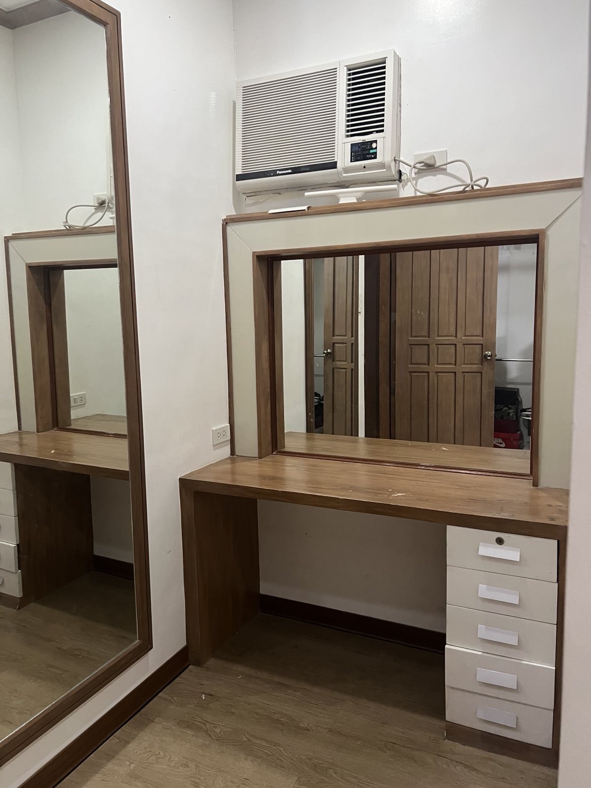 Built-in vanity and dressing area with full-length mirror