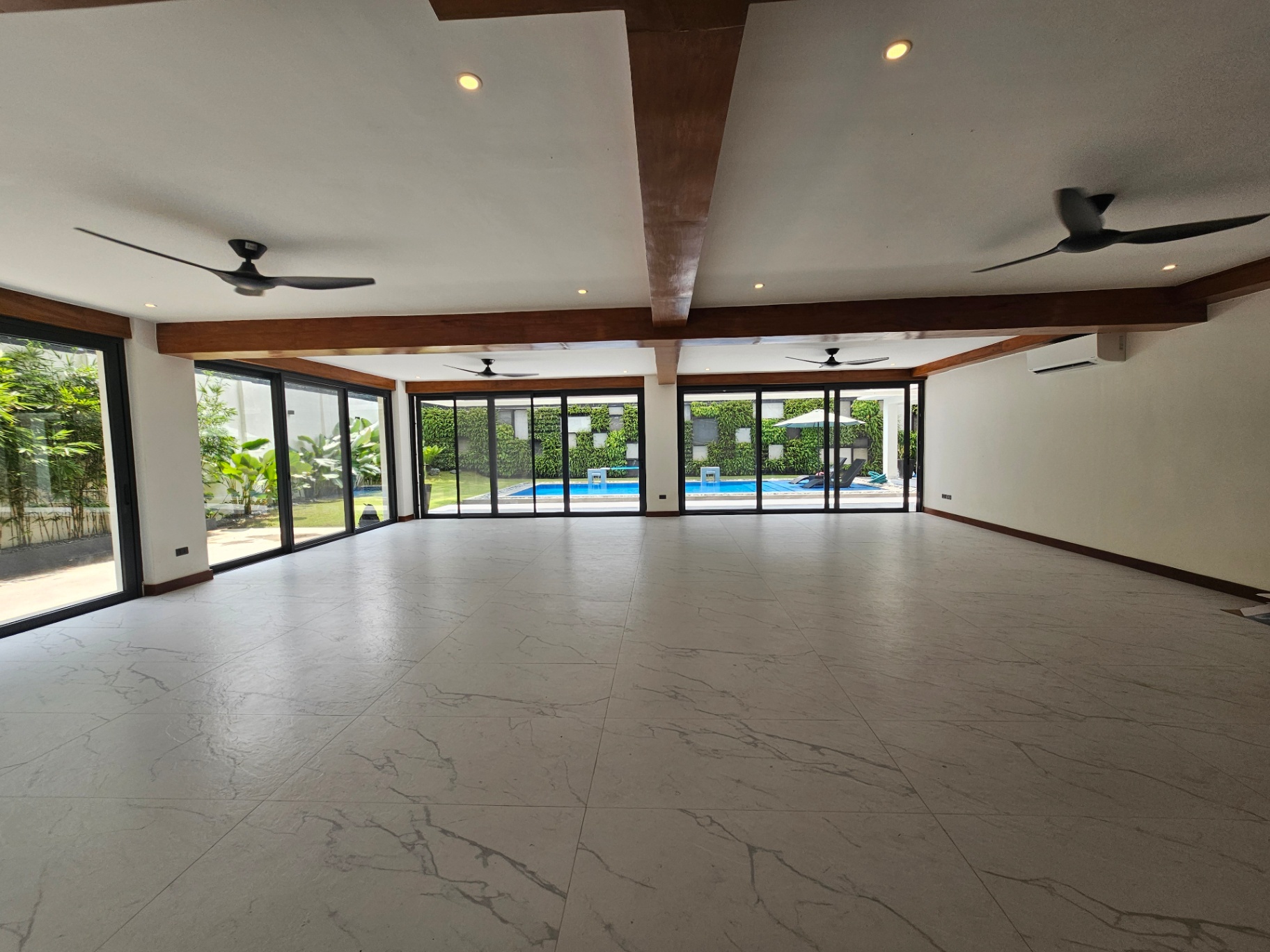 Lower ground entertainment room opening directly to the pool