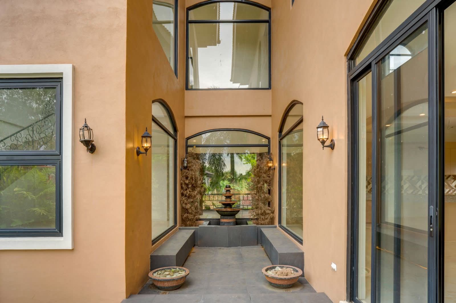 Central atrium with tiered stone fountain