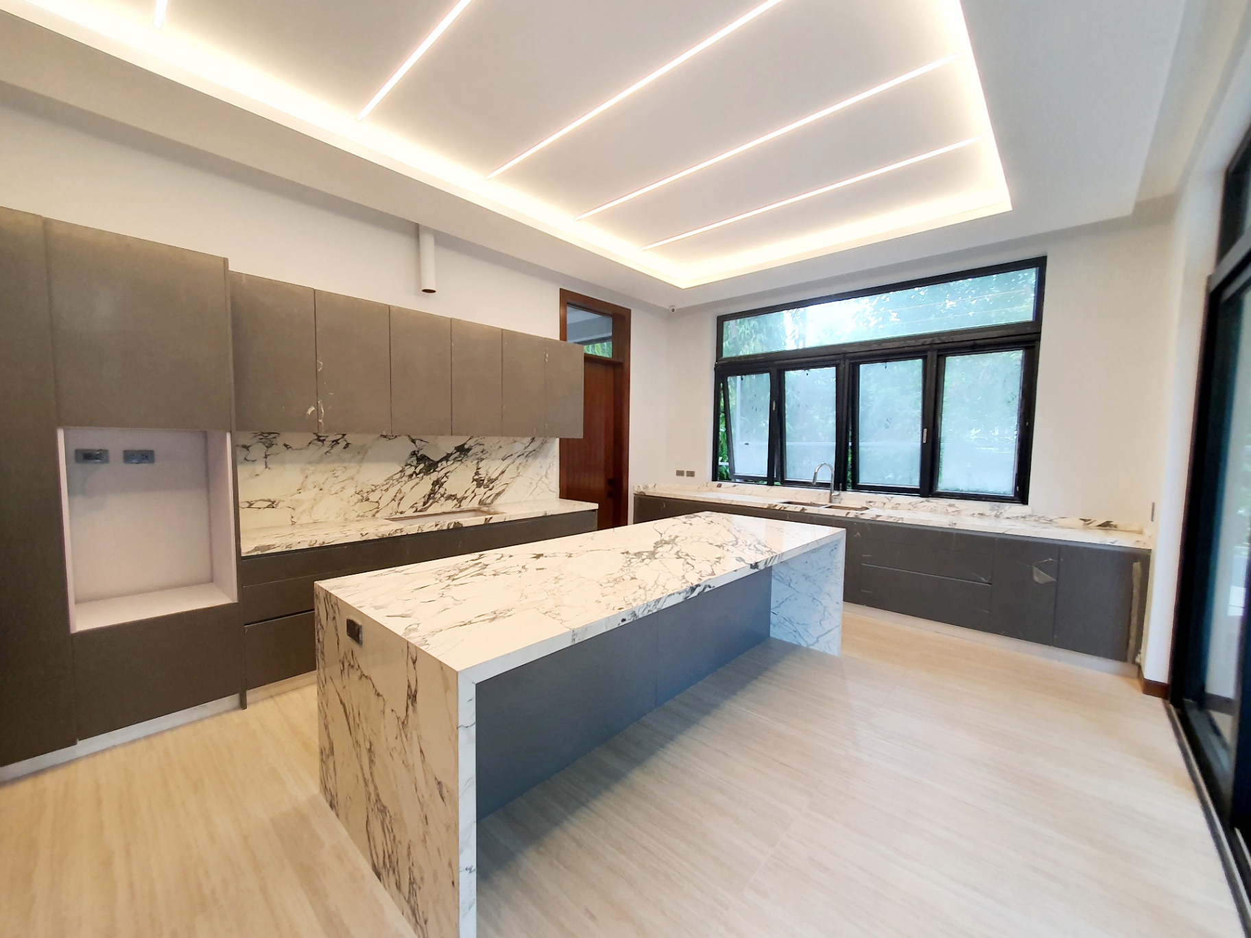 Modern kitchen with marble island and twin work zones
