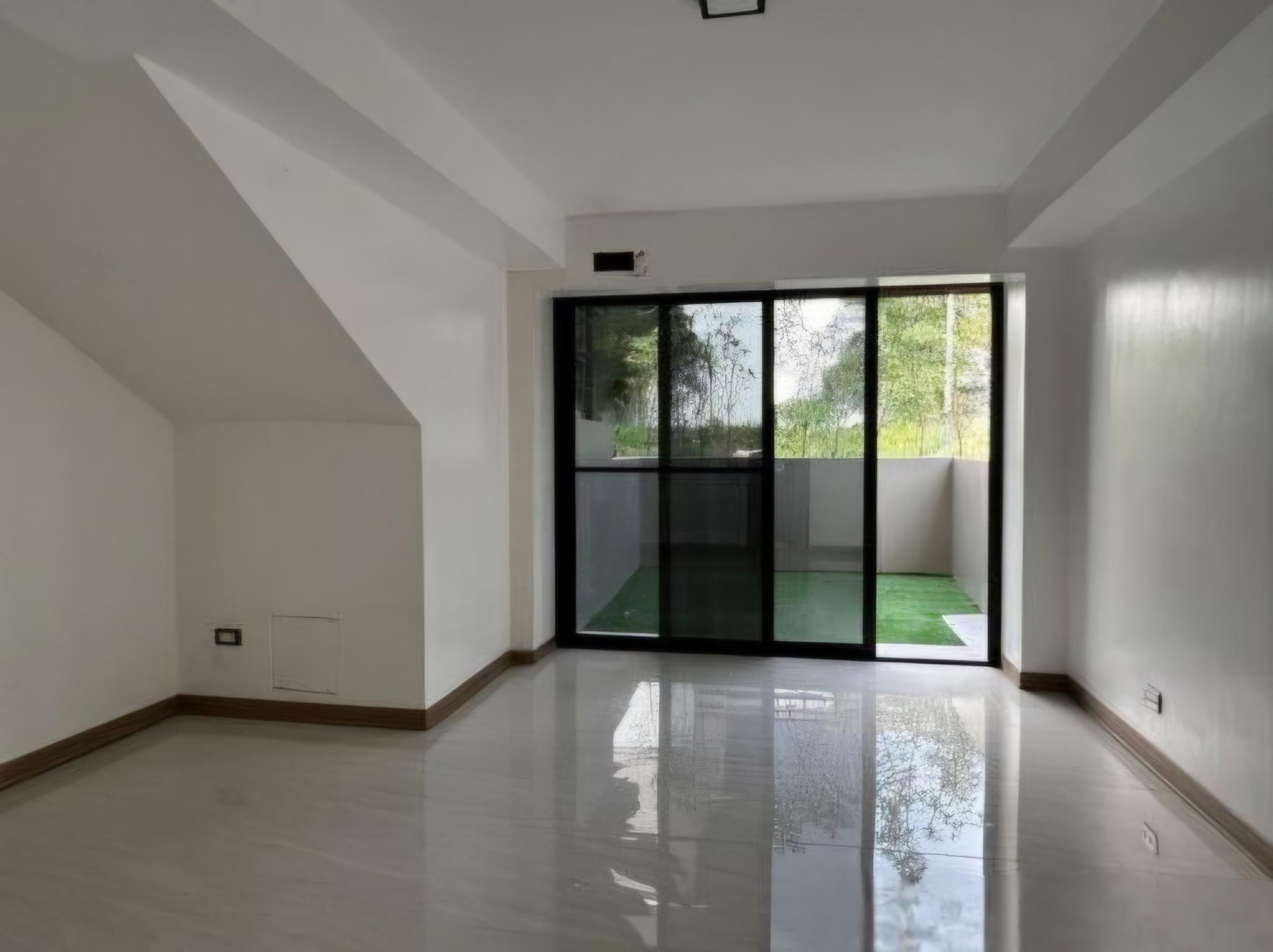 Living space opening to a private landscaped courtyard