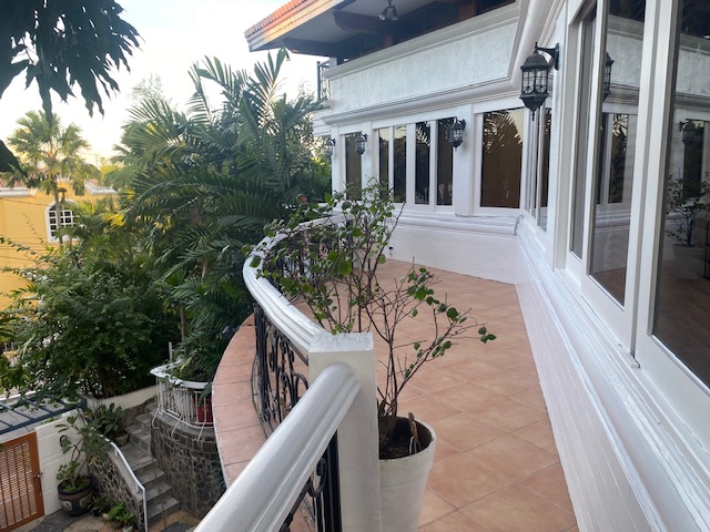 Curved terrace balcony overlooking the garden