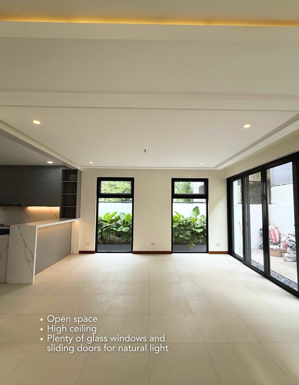 Living space with garden-view glass windows