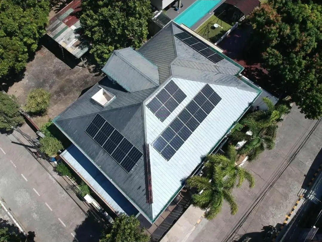 Aerial view of the roof lined with solar panels