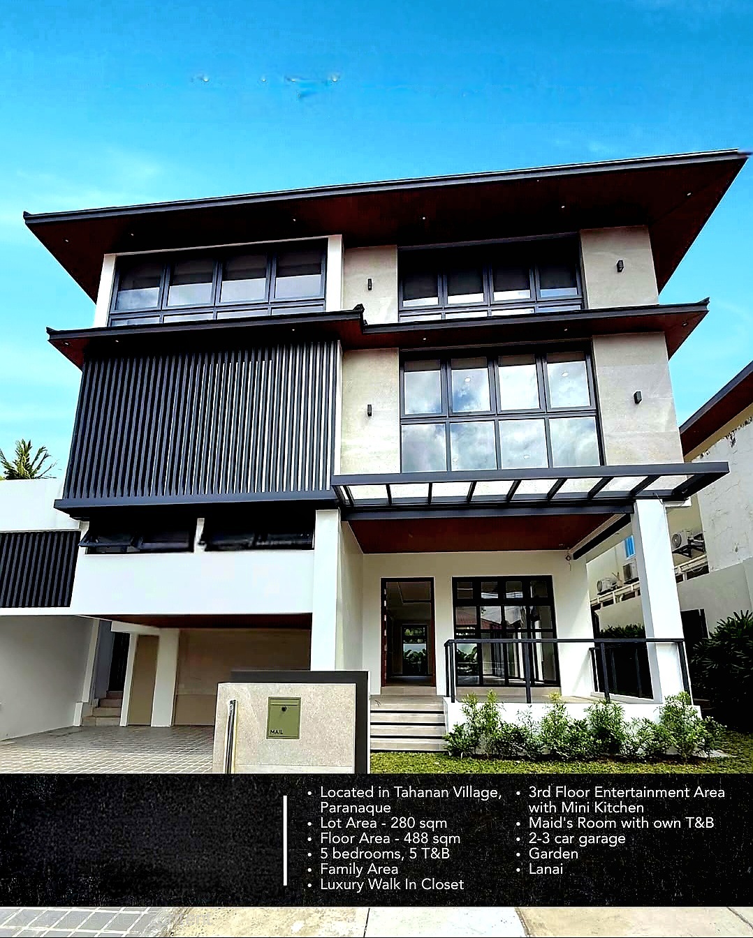 Modern three-storey facade of the Tahanan Village home