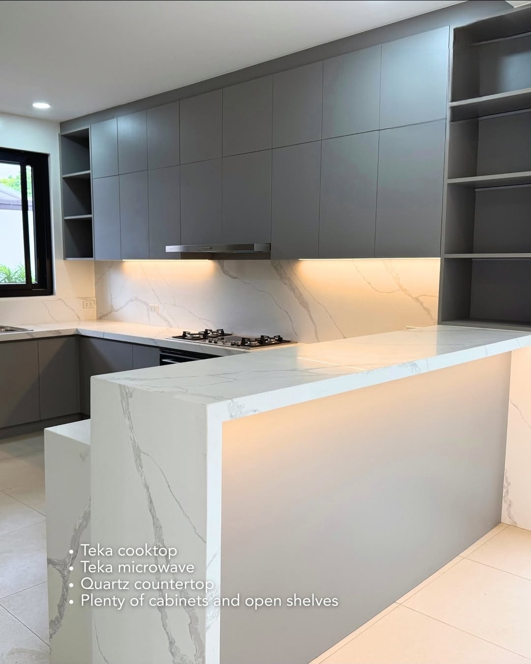 Quartz countertop kitchen with open shelves