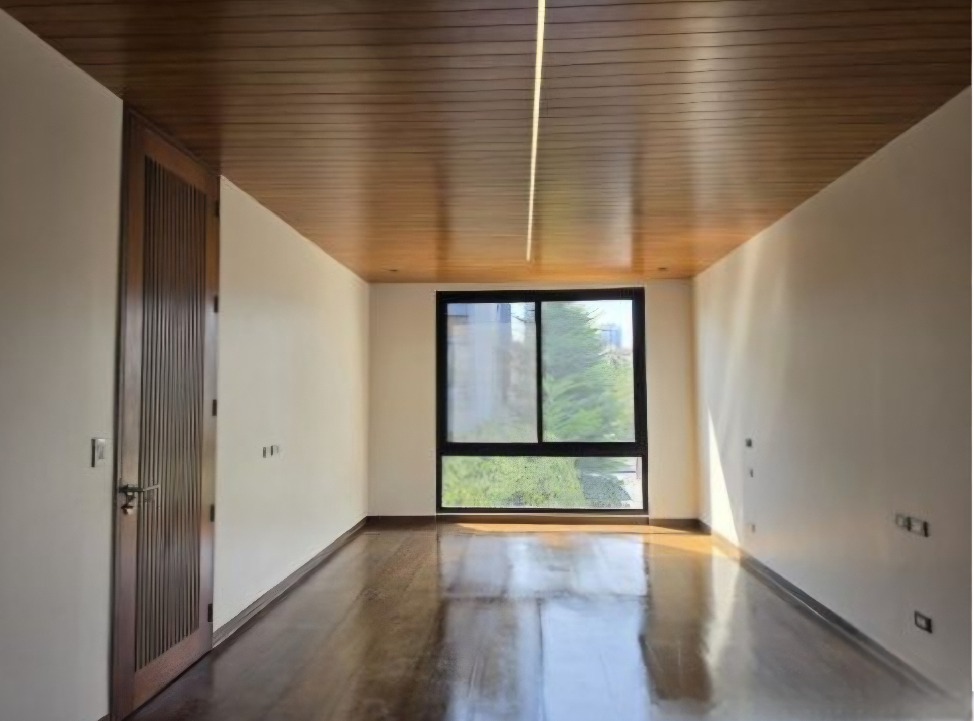 Bright bedroom with hardwood ceiling and garden-view window
