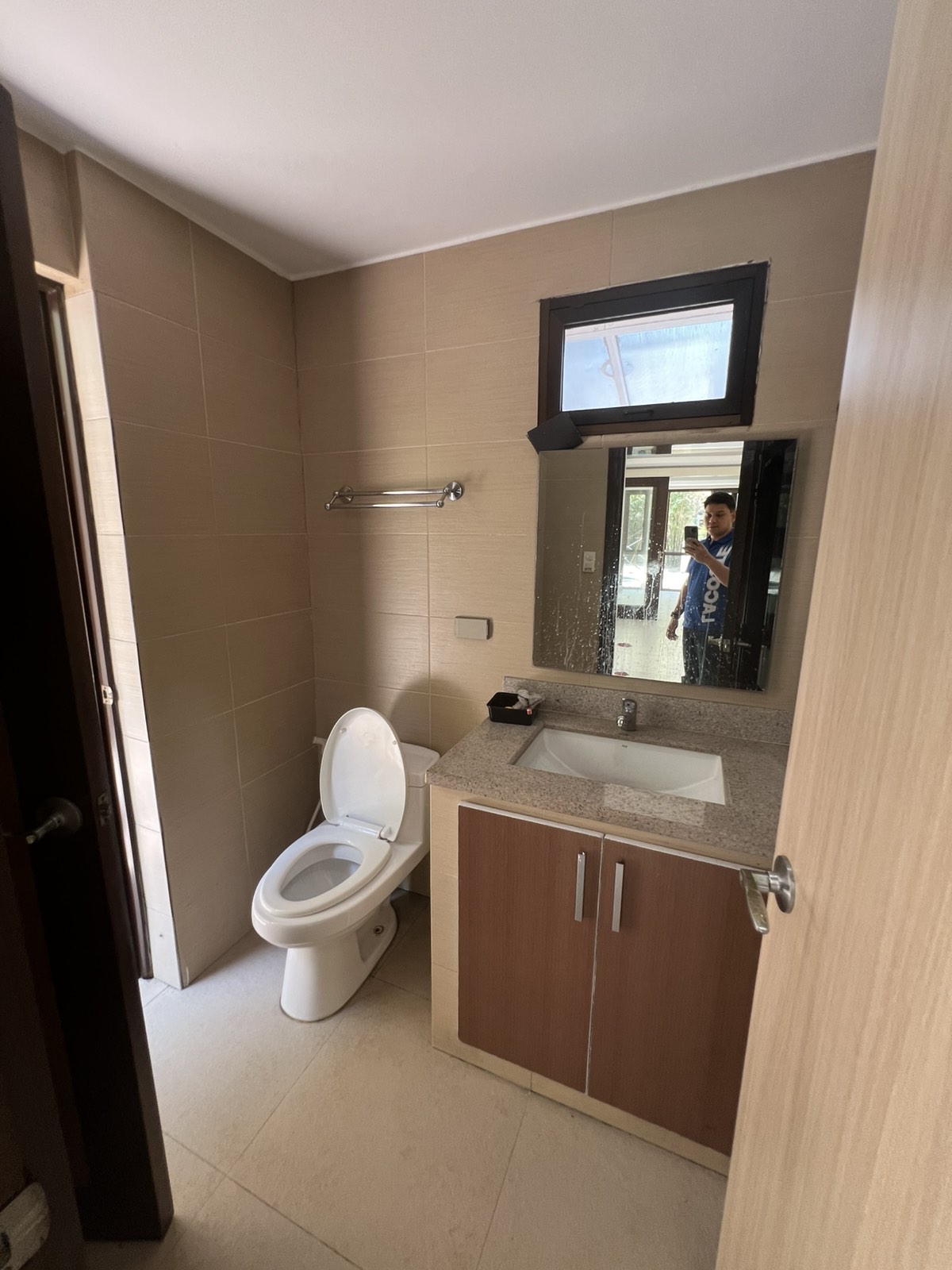 Modern bathroom with stone countertop vanity