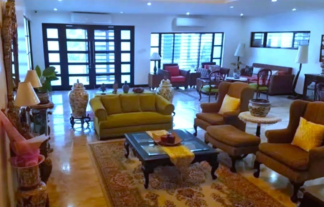 Spacious formal living room with classic furnishings