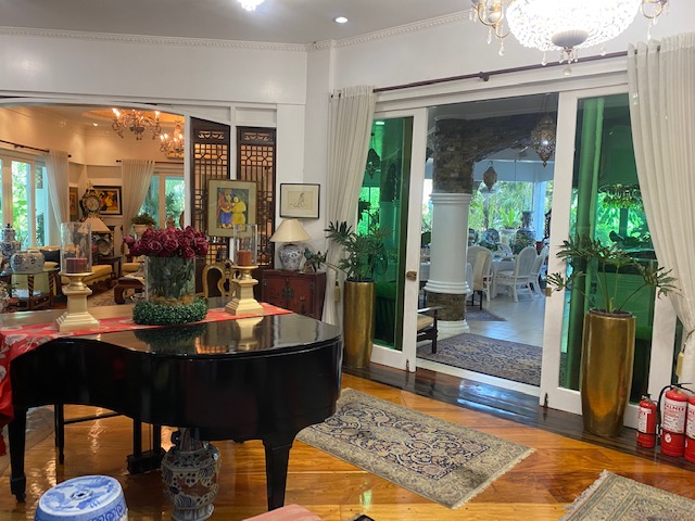 Grand piano gallery opening to the garden