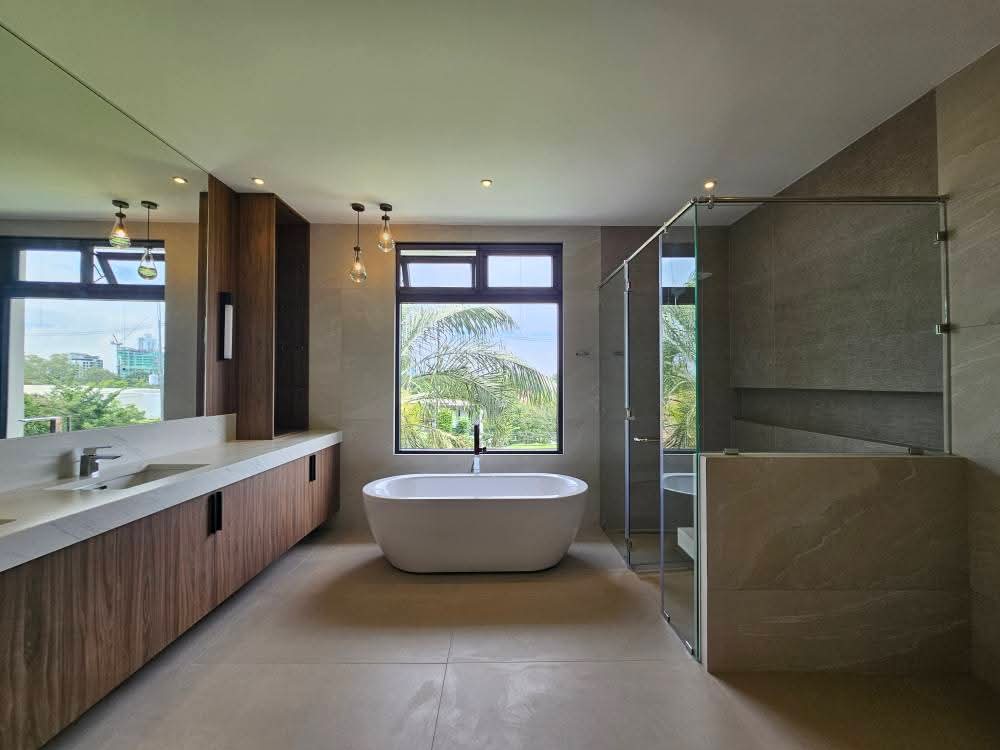 Master bath with freestanding tub and walk-in rain shower