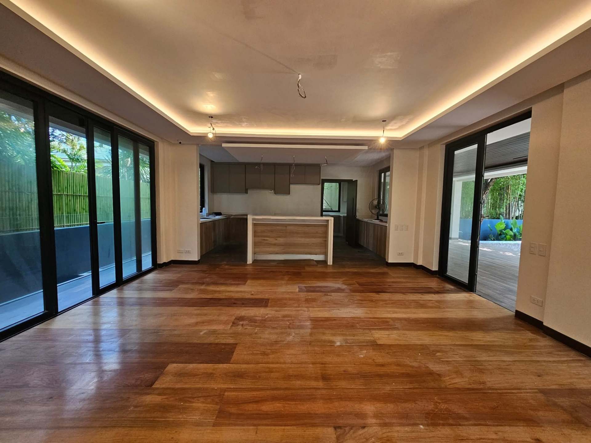 Open kitchen with island, prep counters and pool views