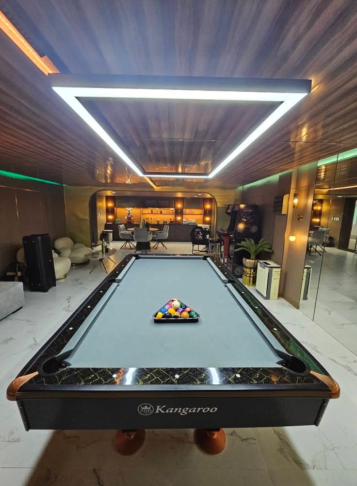Pool-table arcade and game room with mood lighting and bar