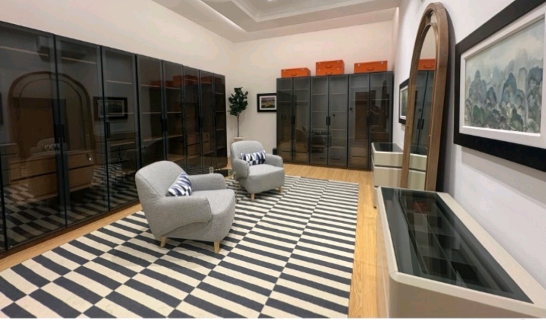 Walk-in dressing room with custom cabinetry