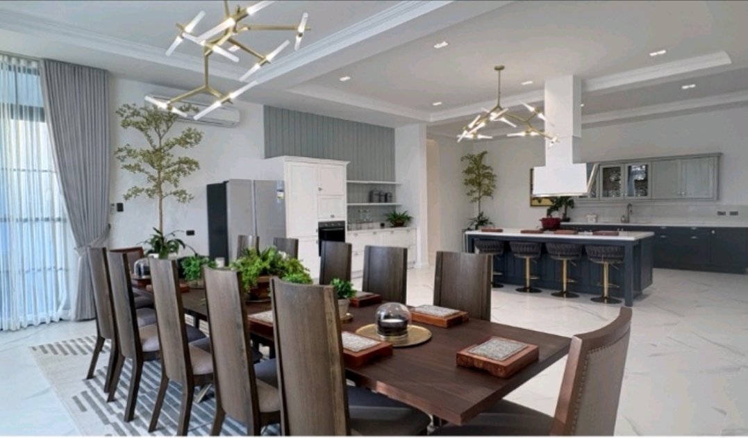Chef's kitchen with marble waterfall island