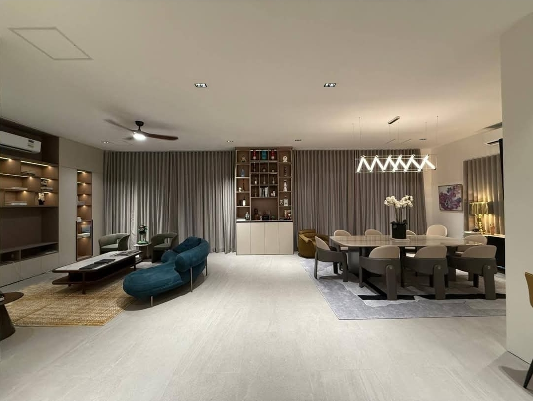 Great room with feature shelving and lounge seating