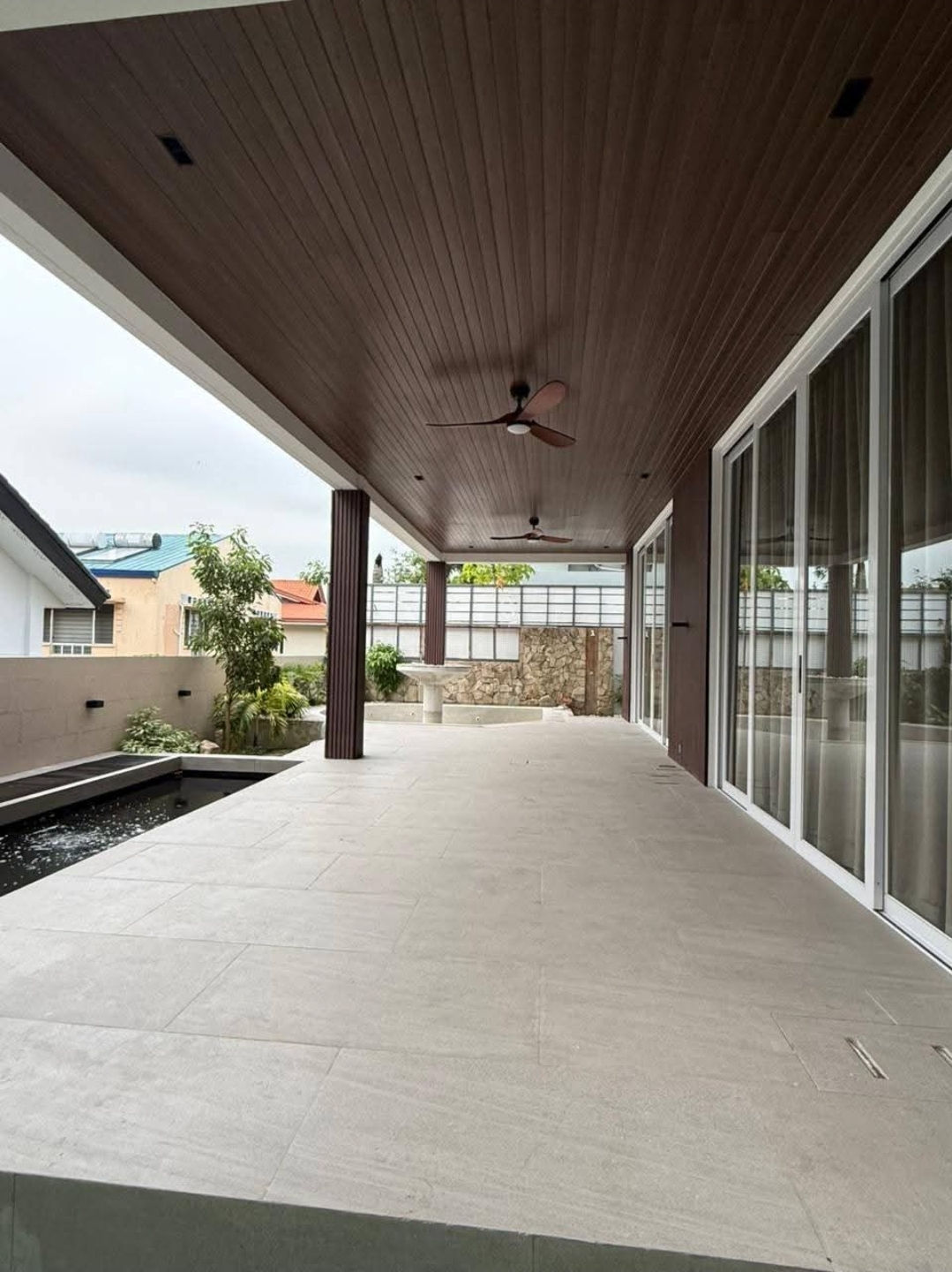 Covered lanai overlooking the koi pond and garden
