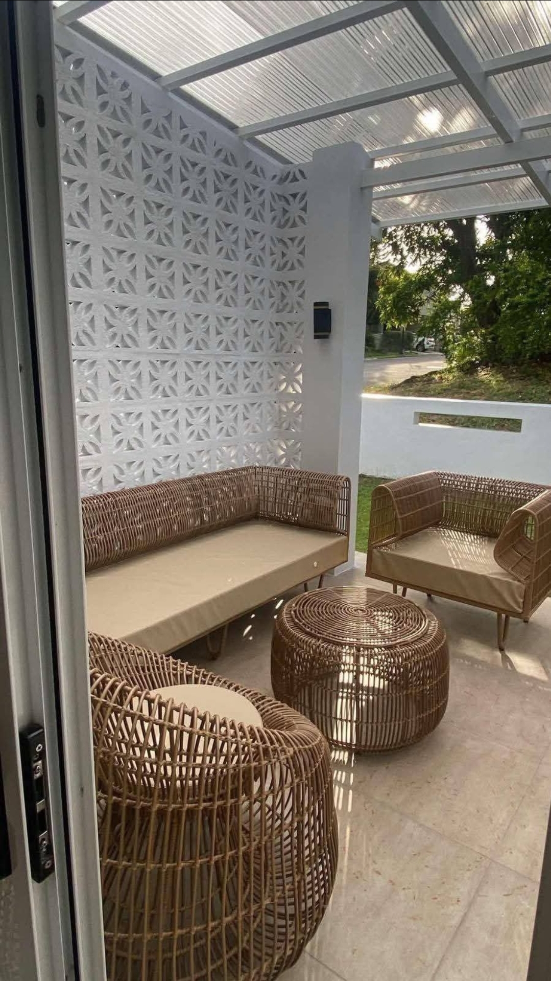 Covered lanai with rattan furniture